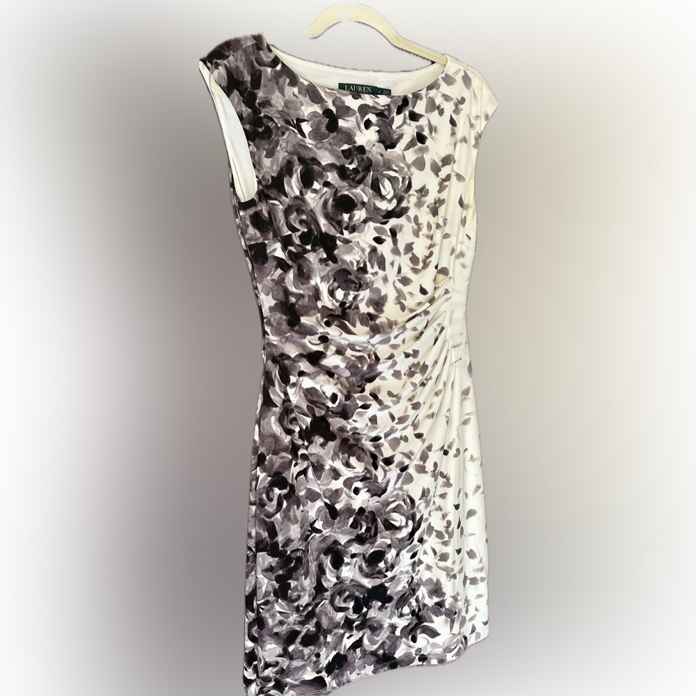 Dressy Dress.  No sleeve. Slimming rouch front panel.